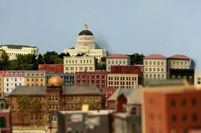 Miniature European town with historic buildings and a central domed landmark